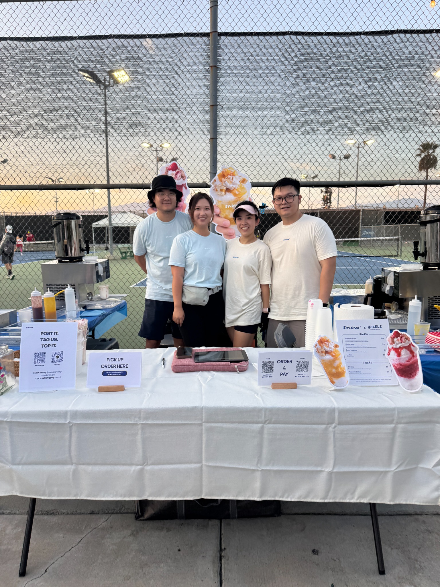 The four Snow° founders at a pop-up event